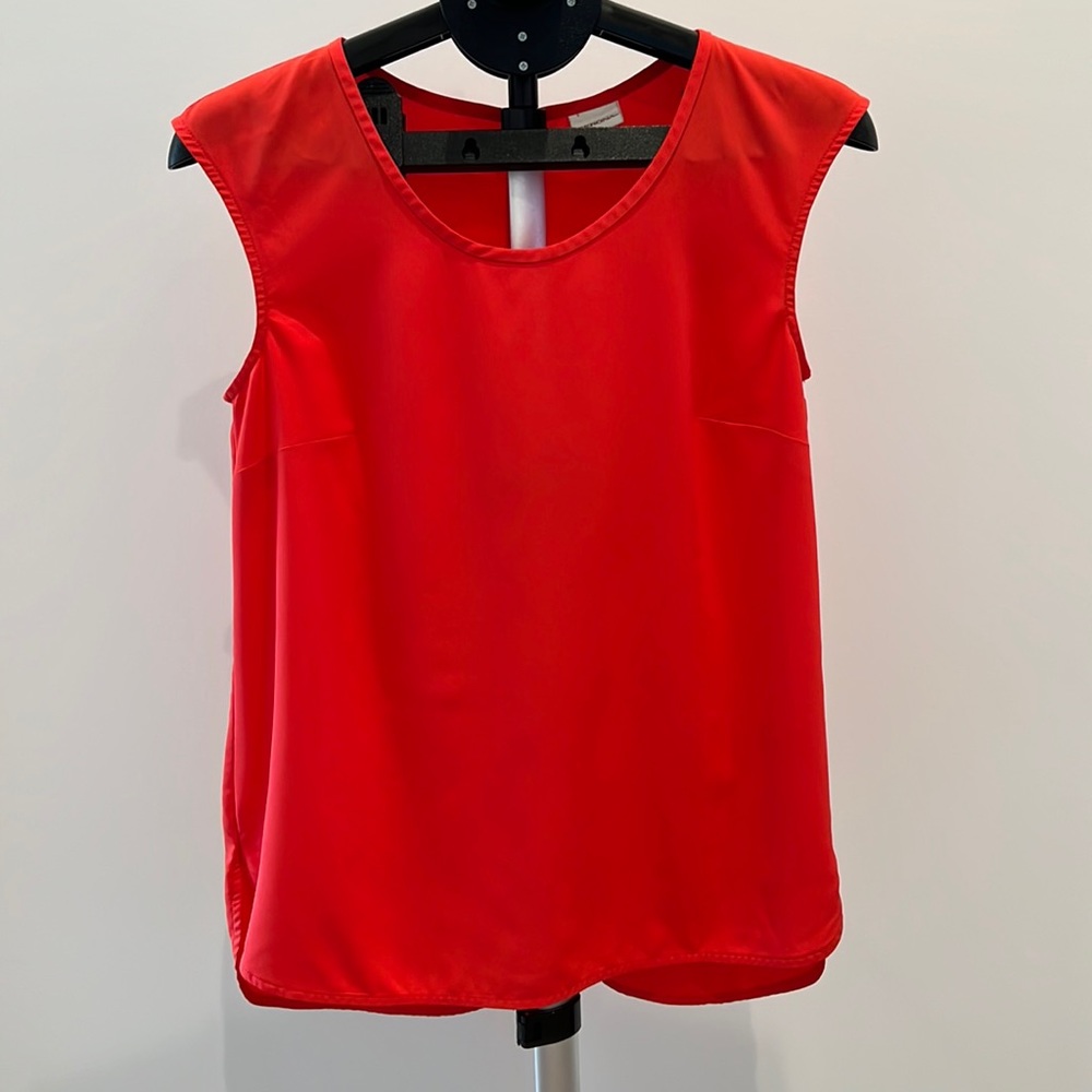 Red sleeveless blouse